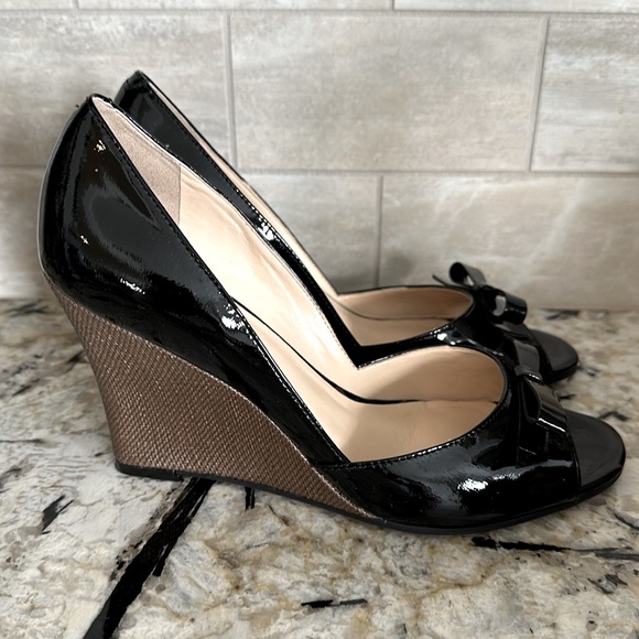 Black patent upscale shoe. Desirable 3 1/2 inch wedge.  Size 7 1/2  M - Picture 3 of 4